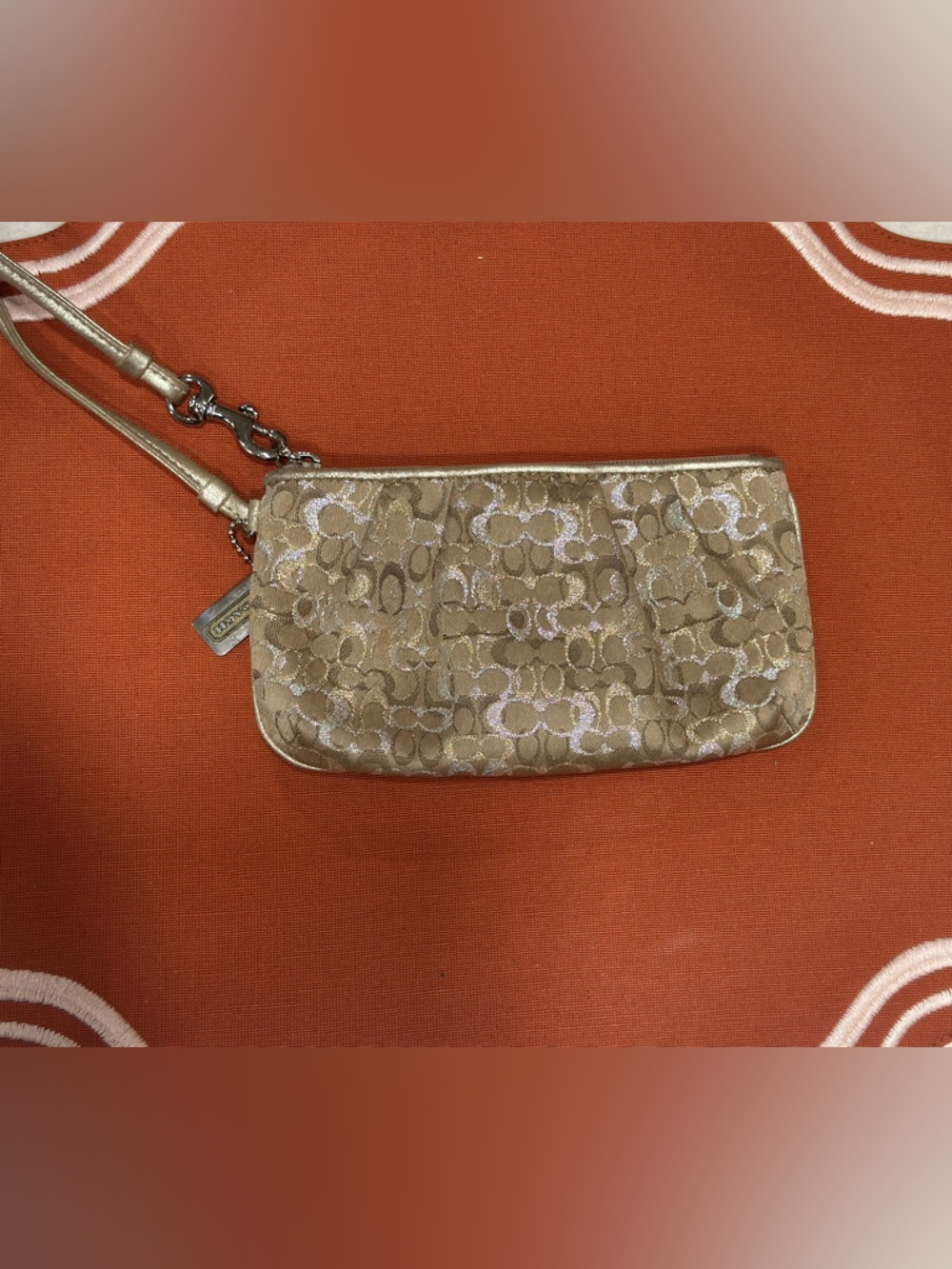 Coach Metallic Signature Wristlet in Gold